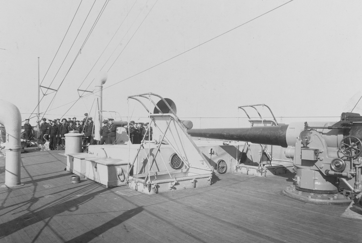A view of Charleston on the forecastle looking forward, 17 November 1905. Note the 6-inch gun, wooden sea chests, open hatches, and ventilators. (Naval History and Heritage Command Photograph NH 78681)