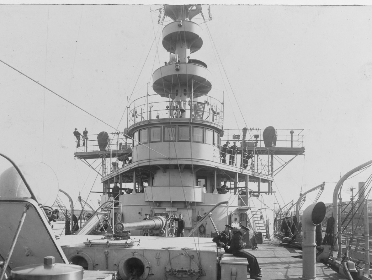 Another early glimpse of the ship, this time the forecastle looking aft, 17 November 1905. Note the bridge details, ventilators, winch cover, and the 6-inch gun. (Naval History and Heritage Command Photograph NH 78682)