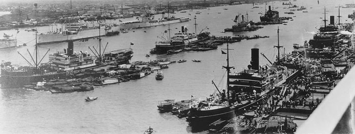 “Man of War Row” in the Whangpoo River, Shanghai, probably photographed in late May or early June 1939. Chaumont is moored in the most distant row, ahead of the Italian cruiser Bartolomeo Colleoni and astern of the French light cruiser Lamotte-Pi...