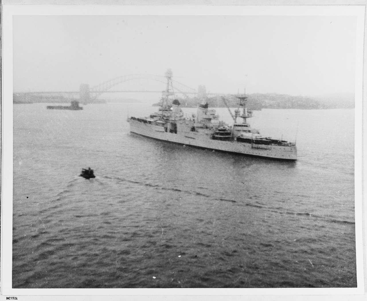 Famed Sydney Harbour Bridge looms through the haze as Chicago enters Sydney, Australia, 20 March 1941. (Naval History and Heritage Command Photograph NH 66291)