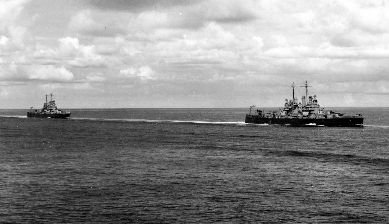 Cruiser Division 12 en route to Port Purvis Anchorage, Florida Island. Cleveland (right) and Columbia (left) as seen from Montpelier, 17 January 1944. (U.S. Navy Photograph 80-G-232109, National Archives and Records Administration, Still Pictures...