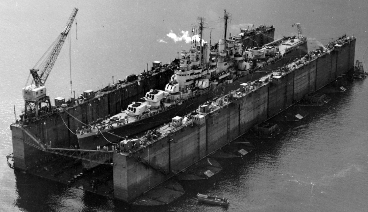 Cleveland undergoing routine overhaul in the advanced base sectional dock ABSD-1 in Espíritu Santo, New Herbides, on 13 January 1944. (U.S. Navy Photograph 80-G-224089, National Archives and Records Administration, Still Pictures Branch, College ...
