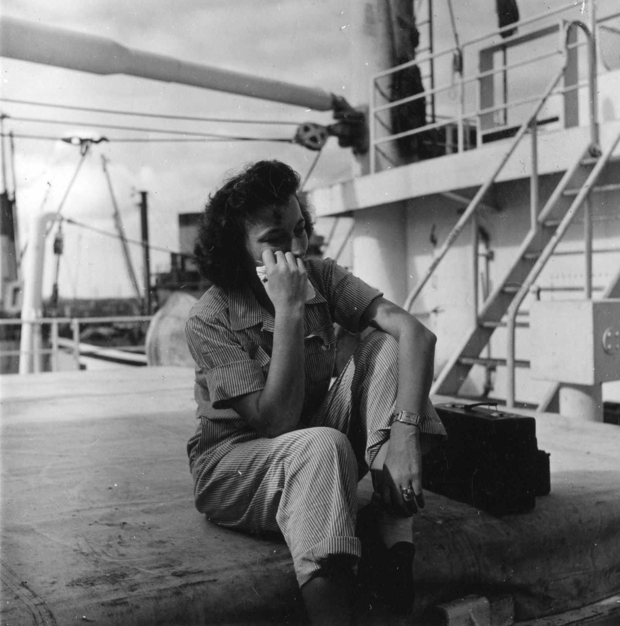 1st Lt. Frances M. LaJeric, Army Nurse Corps, weeps on 3 May 1945 for friends lost when a kamikaze crashed Comfort on 28 April. (U.S. Navy Photograph 80-G-315875, CSP Jerome Zerbe National Archives and Records Administration, Still Pictures Divis...