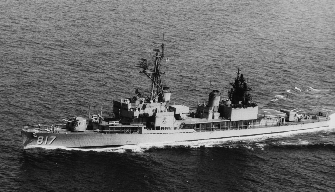 Corry displays a distinctively different profile as she steams at sea following her FRAM I conversion, 8 October 1965. The ASROC launcher rises amidships, and the DASH hangar and flight deck are situated aft. (PH1 R. Campbell, Naval History and H...