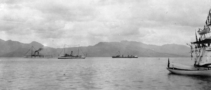 Asiatic Fleet ships dressed for George Washington’s Birthday, 22 February 1915. The three ships in the distance are (from left to right): Cincinnati (Cruiser No. 7); Piscataqua (Fleet Tug No. 49); and Dale. (Naval History and Heritage Command Pho...