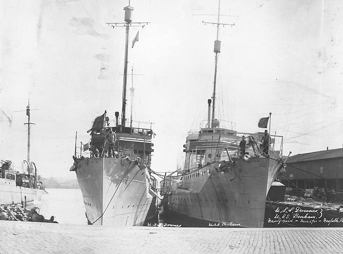 Downes, at left, and Benham (DD-49) at the Norfolk Navy Yard, Portsmouth, Va., 5 March 1921. (Photographed by Crosby, 324 First Street, Portsmouth, Va.; Naval History and Heritage Command Photograph NH 104056)