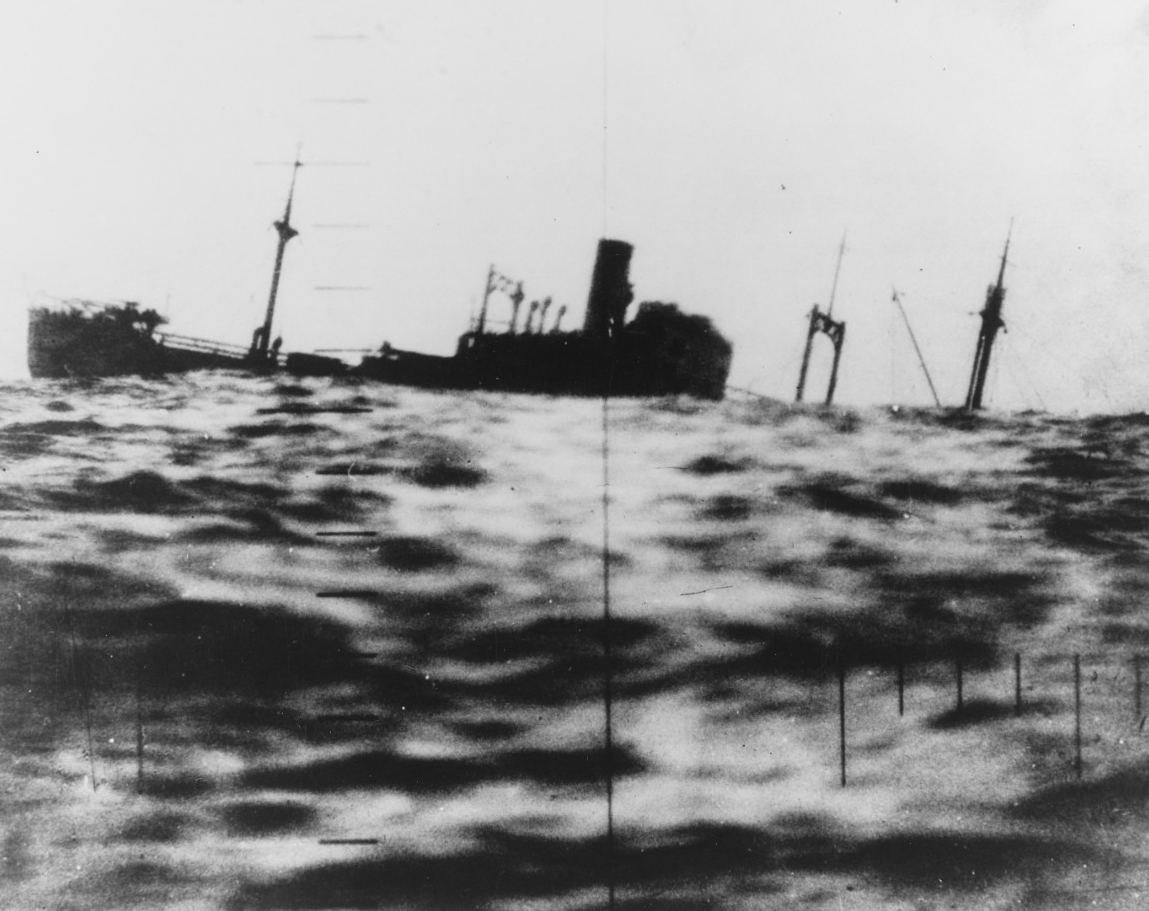 A Japanese cargo ship as observed through Drum’s periscope. Photo released on 12 June 1945. Note: Ship may be either the Nisshun Maru or Taihaku Maru. (U.S. Navy Photograph 80-G-4903, National Archives and Records Administration, Still Pictures D...
