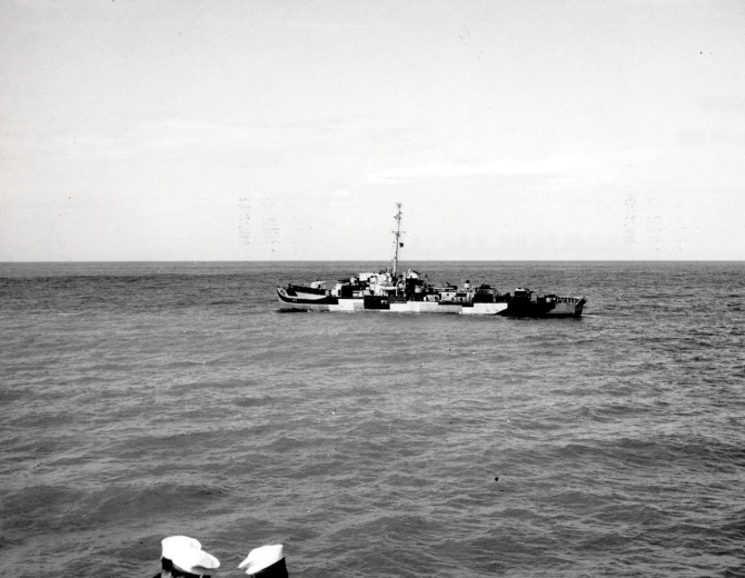 Dufilho slows to steerageway while operating with another ship (just out of the picture at the bottom), circa 1944. (U.S. Navy Photograph 298905, Dufilho (DE-423), Ships History, Naval Heritage and History Command)