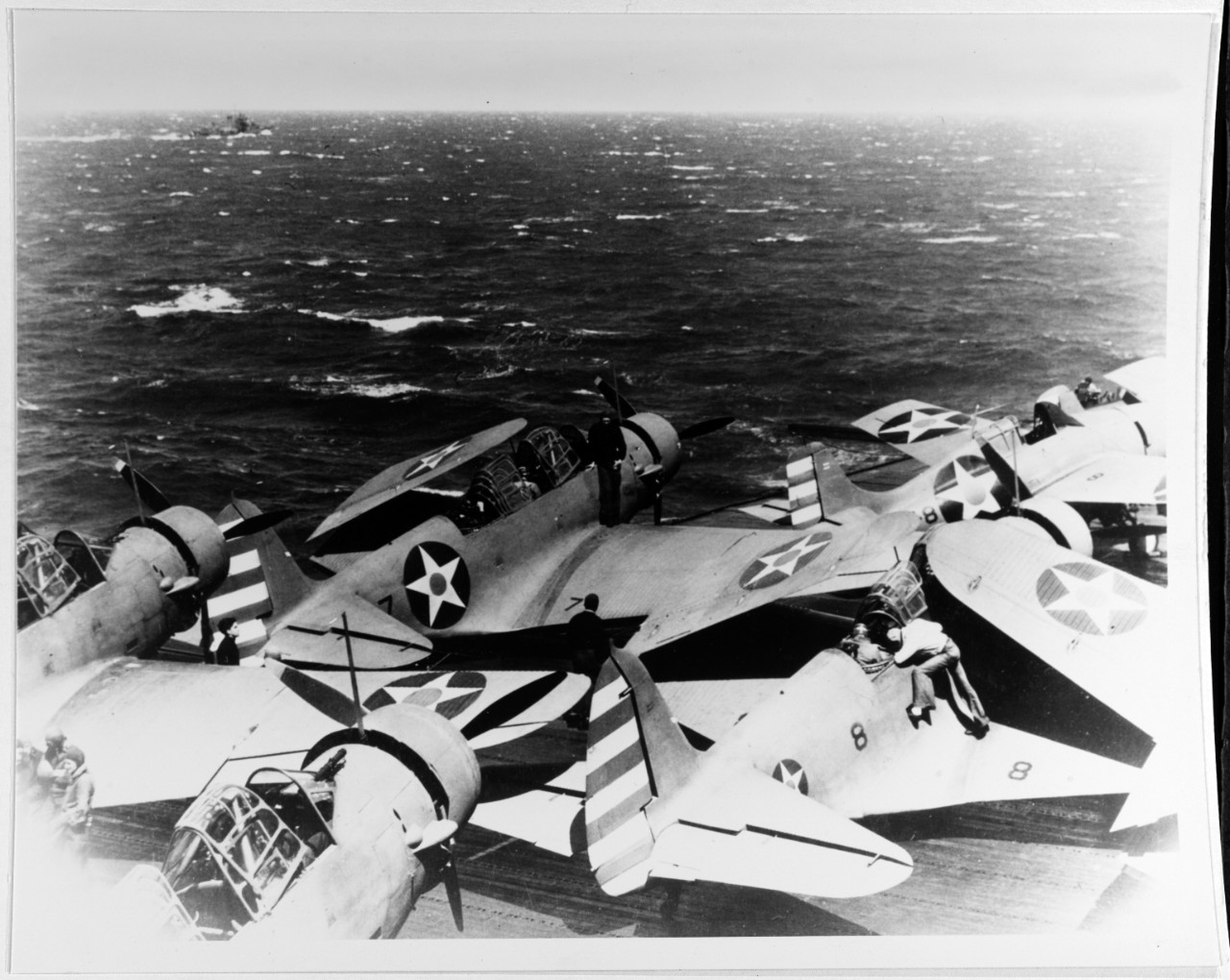 Wildcats and Devastators pack the flight deck of Enterprise as she steams toward Japanese waters during the Halsey-Doolittle Raid, 11 April 1942. (Naval History and Heritage Command Photograph NH 85536)