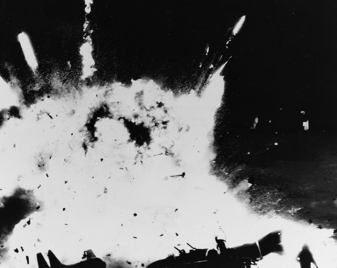 Aircraft and ordnance explode on the ship’s flight deck, 14 January 1969. (U.S. Navy Photograph 1137377, National Archives and Records Administration, Still Pictures Division, College Park, Md.)
