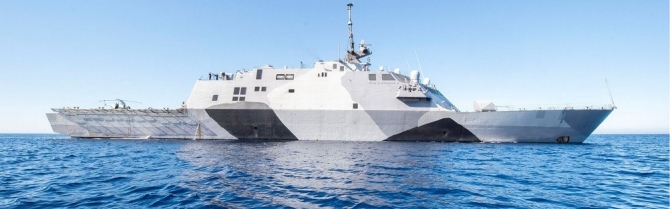 This shot of Freedom (LCS-1) at sea represents the class and aptly displays her disruptive camouflage paint scheme, intended to distort the ship’s silhouette to confuse enemy lookouts from identifying her maneuvering. (U.S. Navy photograph, Navy NewsStand).