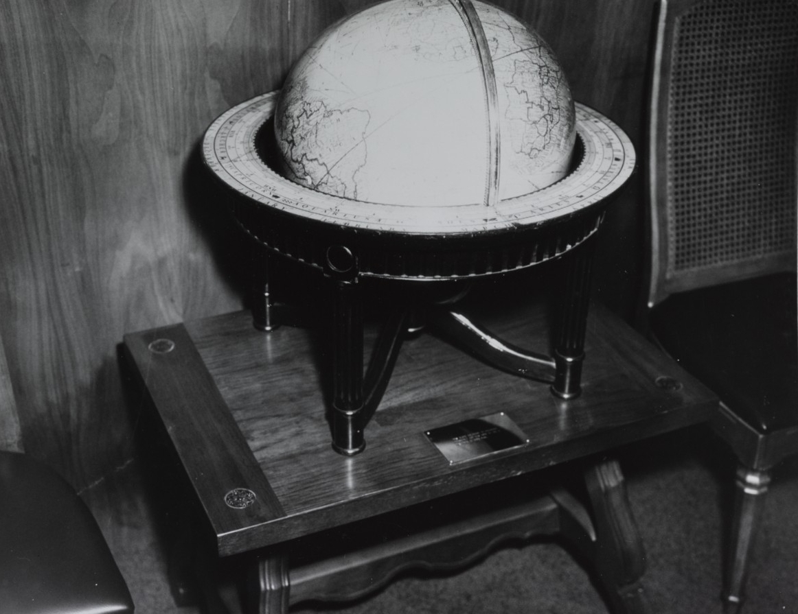 The ship receives the donation of this unique globe of the earth, which once belonged to her namesake President Franklin D. Roosevelt, in 1969. (Naval History and Heritage Command Photograph NH 68719-KN)