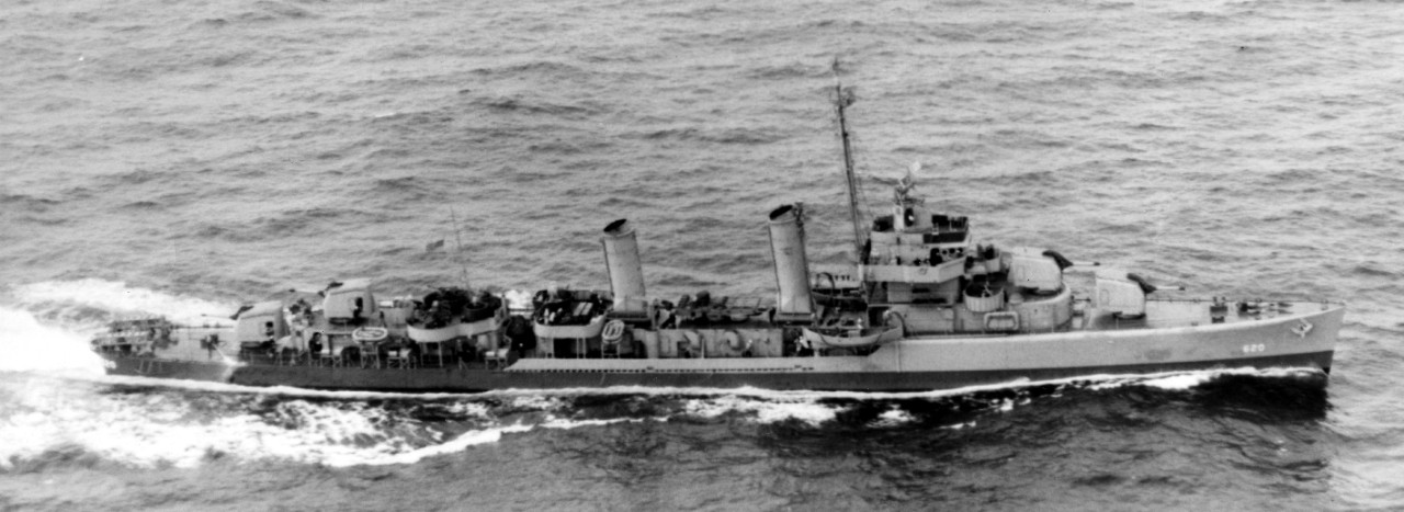 Underway at sea, 26 May 1943, still wearing two-color camouflage, the dividing line parallel with the horizon and not the sheer of the ship. Note centerline 20-millimeter mount fitted ahead of, and at the same level of, the bridge. (U.S. Navy Pho...