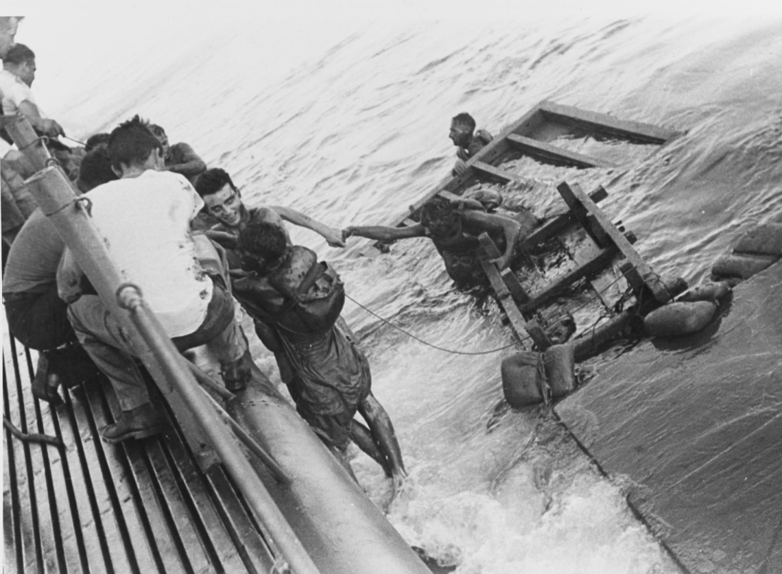 Emaciated British and Australian prisoners of war being rescued by Sealion (SS-315) on 15 September 1944. The POWs had been on board unmarked transports en route from Singapore to Japan when their ships were sunk by Sealion, Growler, and Pampanit...