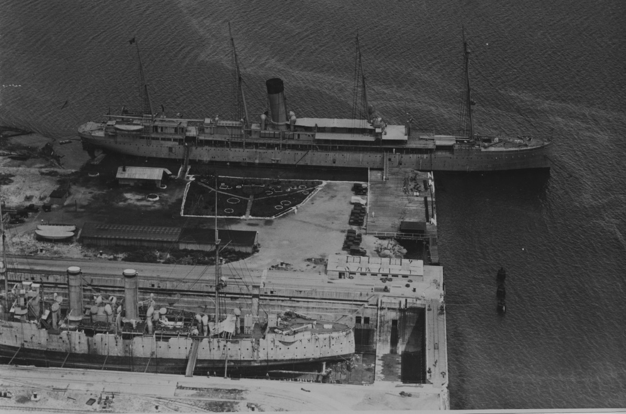 Hancock at Pearl Harbor Navy Yard, 23 July 1924. Notice the ship undergoing maintenance in dry dock in the foreground. (U.S. Navy Photograph 80-G-1017213, National Archives and Records Administration, Still Pictures Division, College Park, Md.)