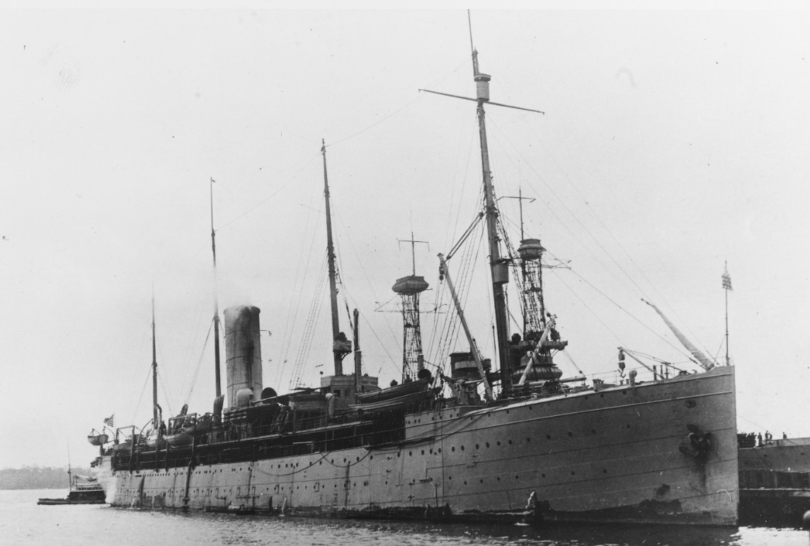 Hancock probably photographed at the Philadelphia Navy Yard, Pa., in 1919. Note the cage masts and fire control tops of a South Carolina-class battleship in the background (Naval History and Heritage Command Photograph NH 43122)