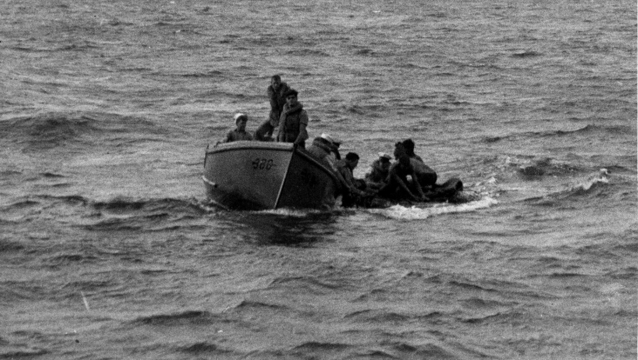 Helm’s 26-foot motor whaleboat crew rescues Neosho survivors, one of whom would die before the day was out. (U.S. Navy Photograph 80-G-32132, National Archives and Records Administration, Still Pictures Division, College Park, Md.)
