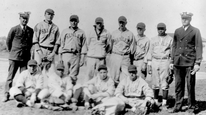 The intramural baseball team from Henley during the ship’s service with the Coast Guard. Note that two of the team members (front row, 2nd from left; back row, 2nd from right) are African-American. This photo precedes the integration of Major League baseball by Jackie Robinson and Branch Rickey in 1947. (USCG Historian’s Office, no date).