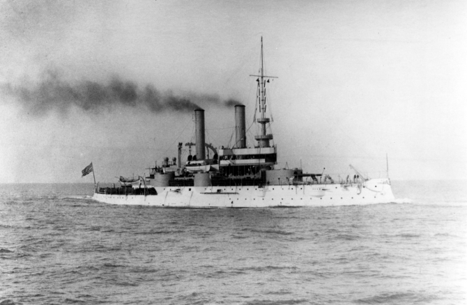 Iowa steams in the North Atlantic, circa 1905. Note the semaphore "paddles" mounted on her foremast. (Naval History & Heritage Command Photograph NH 60248-A, original photograph by the Burr McIntosh Studio, Naval Historical Foundation, Rodgers Collection)