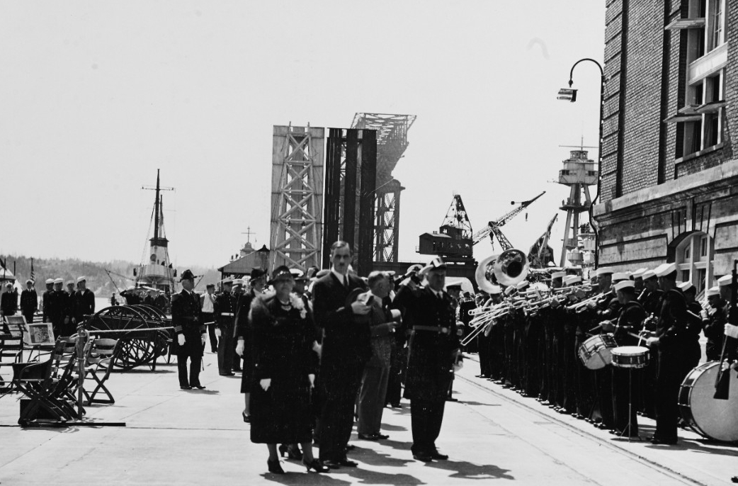 Three governors, Barzilla W. Clark of Idaho, Charles H. Martin of Oregon, and Clarence D. Martin of Washington, and Rear Adm. and Mrs. Thomas T. Craven, receive honors as they arrive for the christening ceremonies of Patterson (DD-392) and Jarvis...