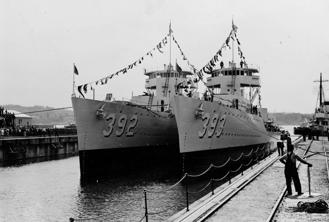Colorfully dressed Patterson (left) and Jarvis leave the building dock at Puget Sound the day after their christening, 7 May 1937. (Naval History and Heritage Command Photograph NH 63389)
