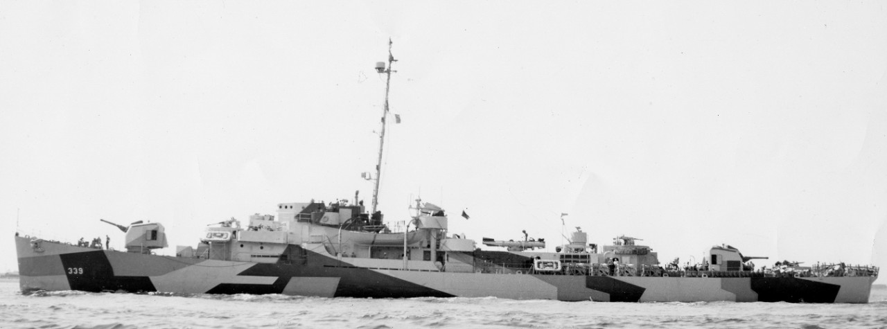 Port side view of John C. Butler, Boston, 29 May 1944; note unstowed depth charges on the main deck, aft. (U.S. Navy Bureau of Ships Photograph BS-132040, National Archives and Records Administration, Still Pictures Division, College Park, Md.)