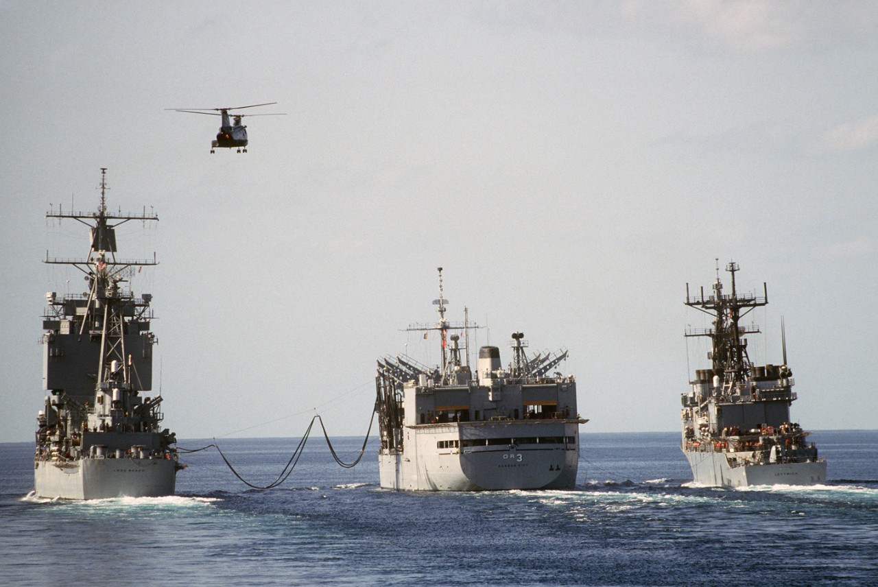 Guided missile cruiser Long Beach (CGN-9), left, and destroyer Leftwich (DD-984), right, during an underway replenishment with Kansas City in the Persian Gulf, November 1987. (U.S. Navy Photograph DN-ST-88-02760, PH1 Chuck Mussi, National Archive...