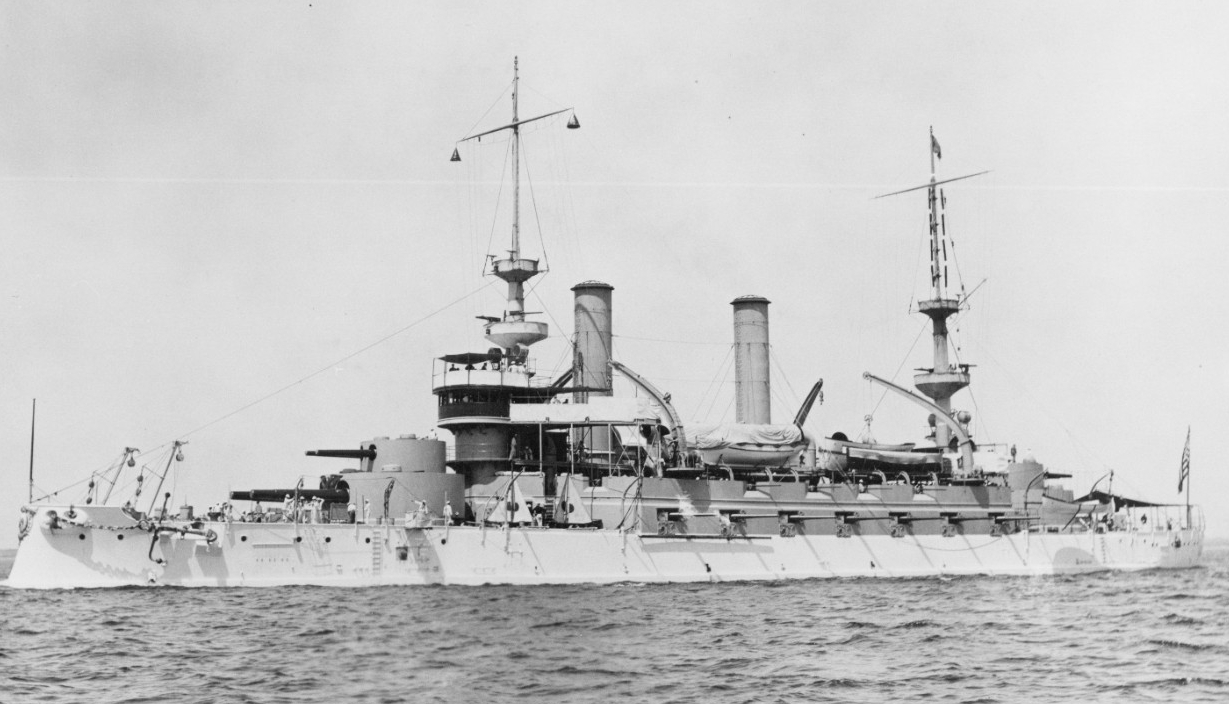 Kearsarge underway, circa 1898–1901. She is painted white from her main and lower decks down, but her paint scheme changes when she visits Europe in 1903, when the main deck and up display a buff color. (U.S. Navy Photograph NH 52036, Naval Histo...