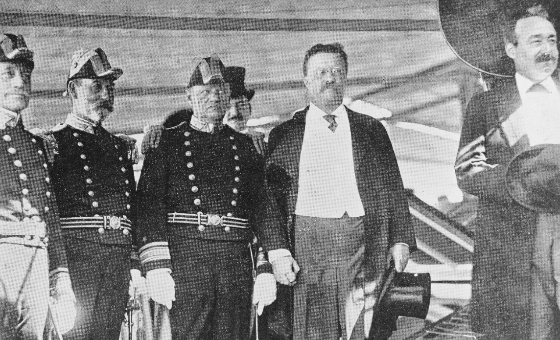President Roosevelt (second from right) reviews the Atlantic Fleet from on board Mayflower off Oyster Bay, N.Y., on Labor Day 1906. With him are (left to left center): Rear Adm. Willard H. Brownson, Commander, Fourth Division; Rear Adm. Charles H...