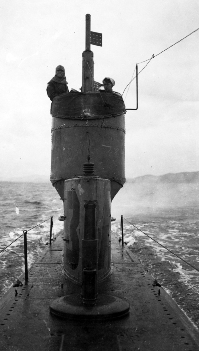 View on AL-3’s deck, looking aft toward the fairwater, while the submarine was underway off Berehaven, Ireland, in 1918. Note L-3's 3-inch/23 caliber deck gun in retracted position just forward of the fairwater. (Naval History and Heritage Comman...