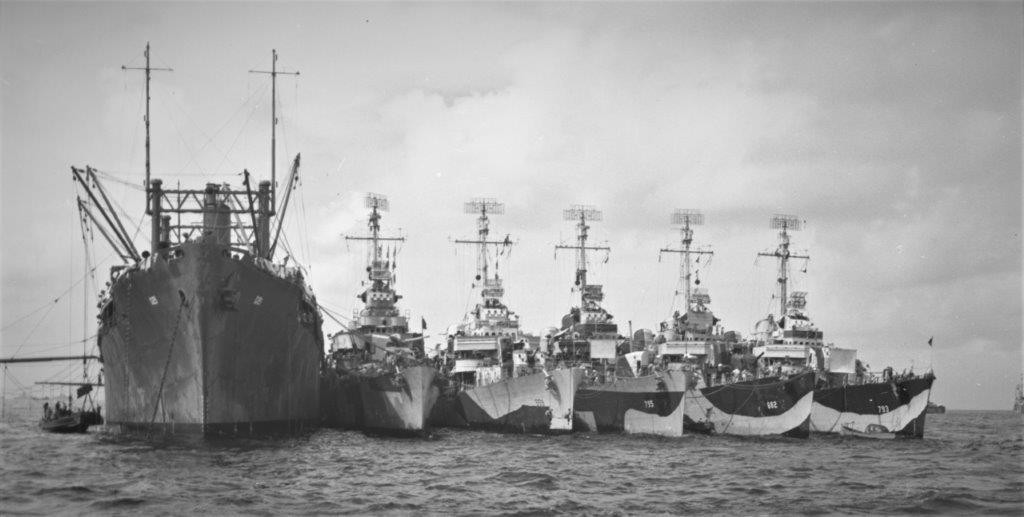 Longshaw (third ship from left) nested at Ulithi alongside the destroyer tender Markab (AD-21), between 2 and 10 December 1944; order of ships (L-R): Markab, Thatcher (DD-514), Longshaw, Preston (DD-795), Porterfield (DD-682), and Cassin Young (D...