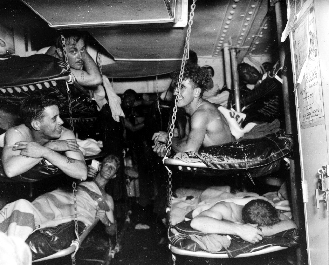 Longshaw’s sailors relax on board Salt Lake City, 18 May 1945, showing various emotions after their ordeal. (U.S. Navy Photograph 80-G-343592, National Archives and Records Administration, Still Pictures Division, College Park, Md.)