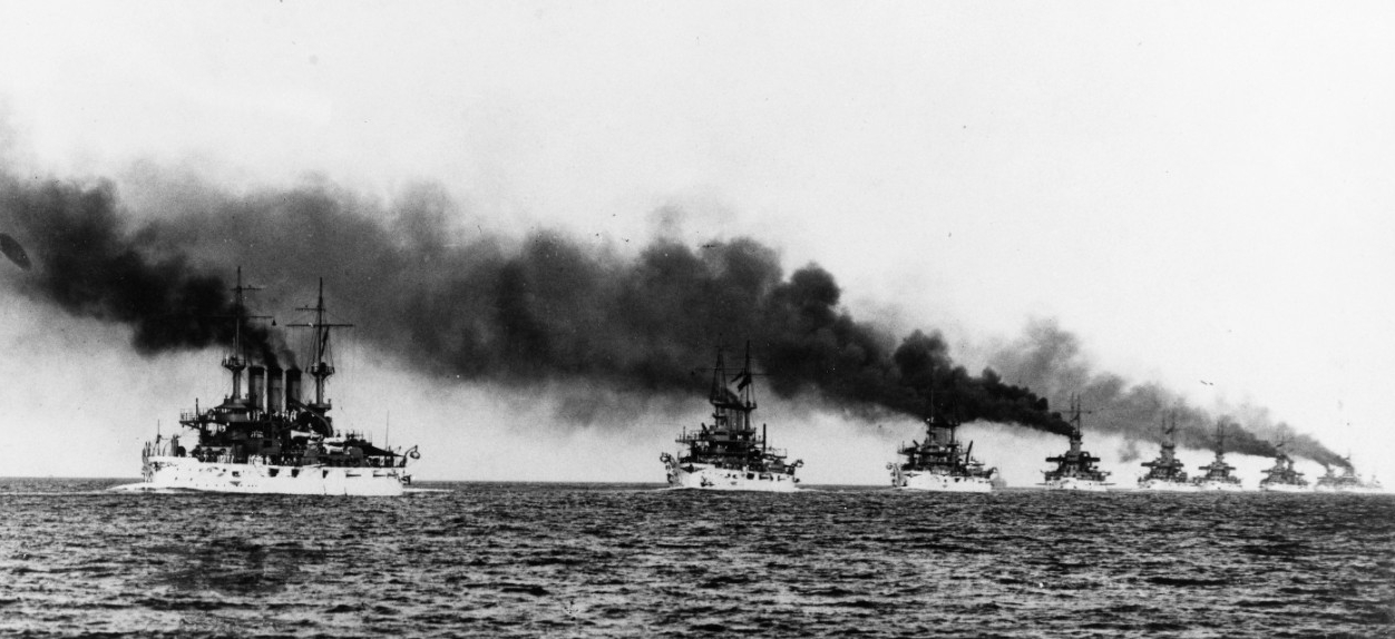 The Great White Fleet steams in column from Hampton Roads, Va. at the beginning of their cruise around the world, 16 December 1907. Kansas (left) and Vermont (next in line) lead the ships in this C. E. Waterman image. (Naval History and Heritage ...