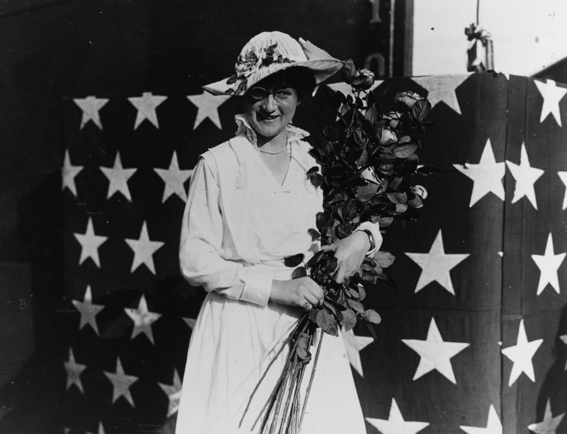 Maumee’s sponsor, Miss Janet Crose, during the ceremonies accompanying the ship’s launching at the Mare Island Navy Yard, Vallejo, Calif., 17 April 1915. (Naval History and Heritage Command Photograph NH 70516)