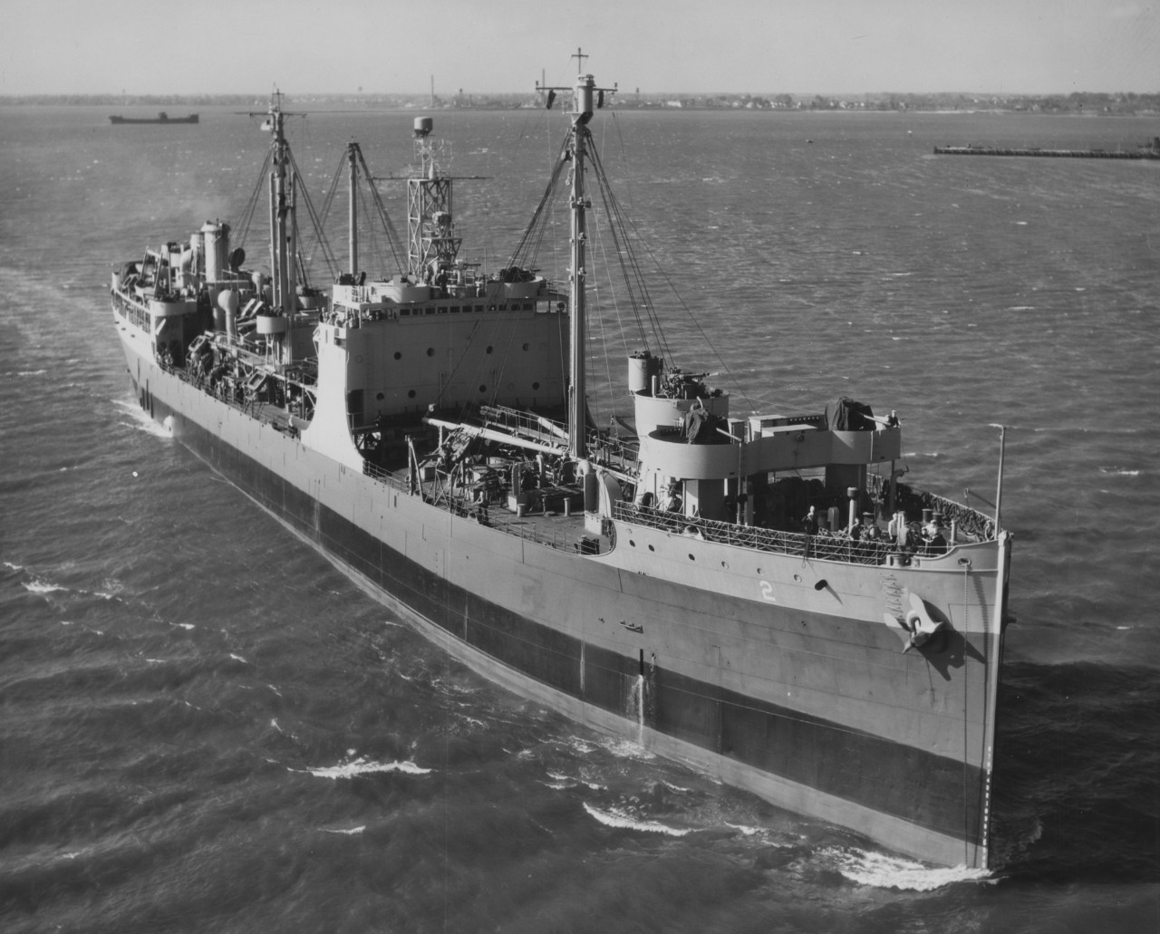 Riding high in the water following her refit at Norfolk Navy Yard, Maumee in Hampton Roads, 31 March 1945. (U.S. Navy Bureau of Ships Photograph, 19-LCM Collection, Box 93, National Archives and Records Administration, Still Pictures Branch, Coll...