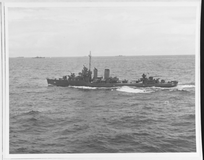 Monaghan at sea, May 1944. Note her distinctive twin stacks and mainmast. (U.S. Navy Photograph 80-G-376093, National Archives and Records Administration, Still Pictures Branch, College Park, Md.)