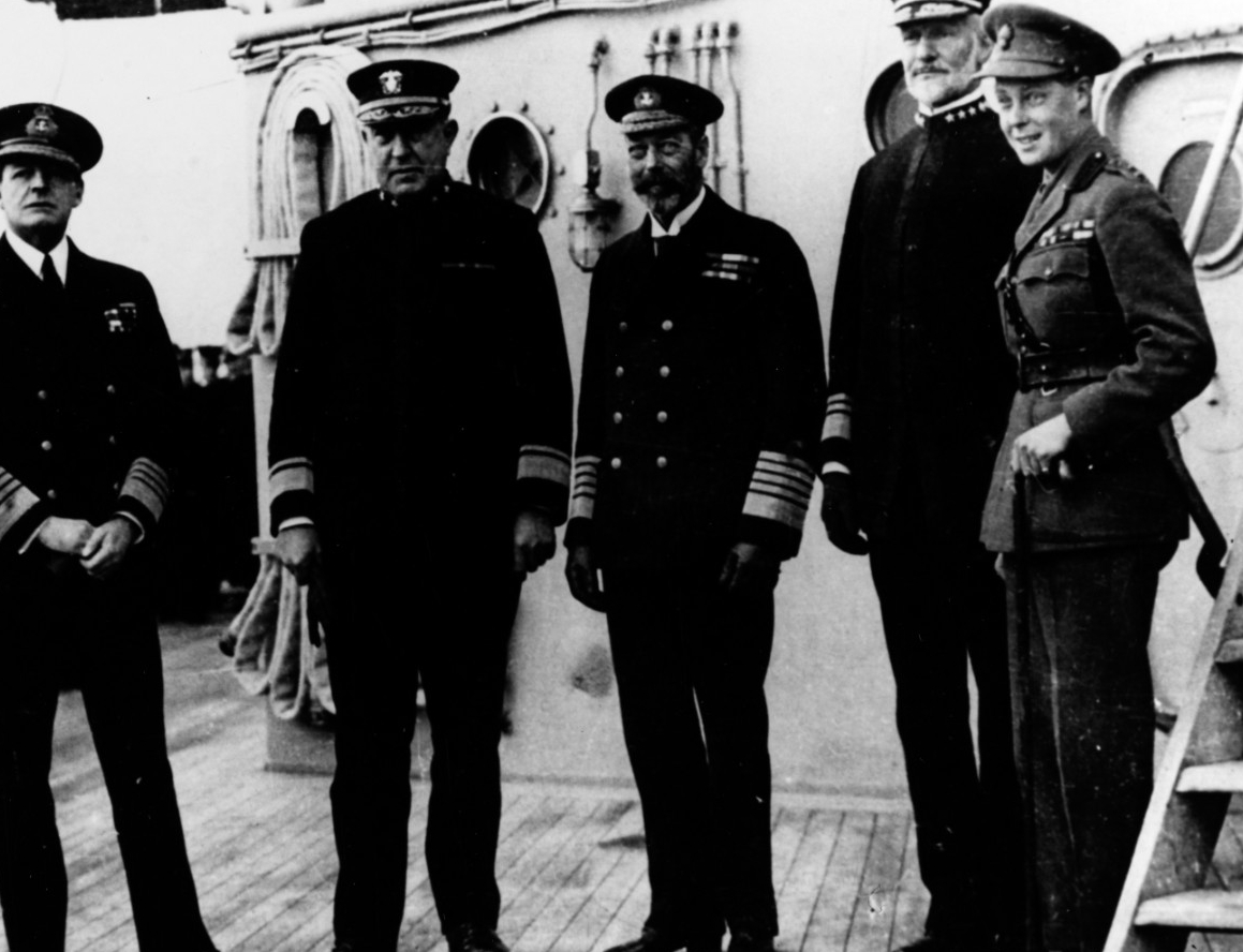 Left to right, Adm. David Beatty, RN; Rear Adm. Rodman; King George V; Vice Adm. William S. Sims; and the Prince of Wales (later King Edward VIII) on board New York, 20 November 1918. Courtesy of Treasure Island Museum, 1976. (Naval History and H...