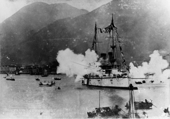 Olympia fires a salute honoring George Washington during the celebration of his birthday while at Hong Kong, 22 February 1898. (Unattributed U.S. Navy Photograph NH 84574, Photographic Section, Naval History and Heritage Command)