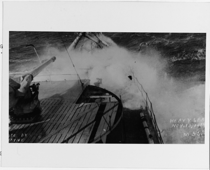 The ship plunges through heavy seas while crossing the Atlantic during her return to the United States, 13 November 1919. (R.E. Wayne, U.S. Navy Photograph NH 2470, Photographic Section, Naval History and Heritage Command)
