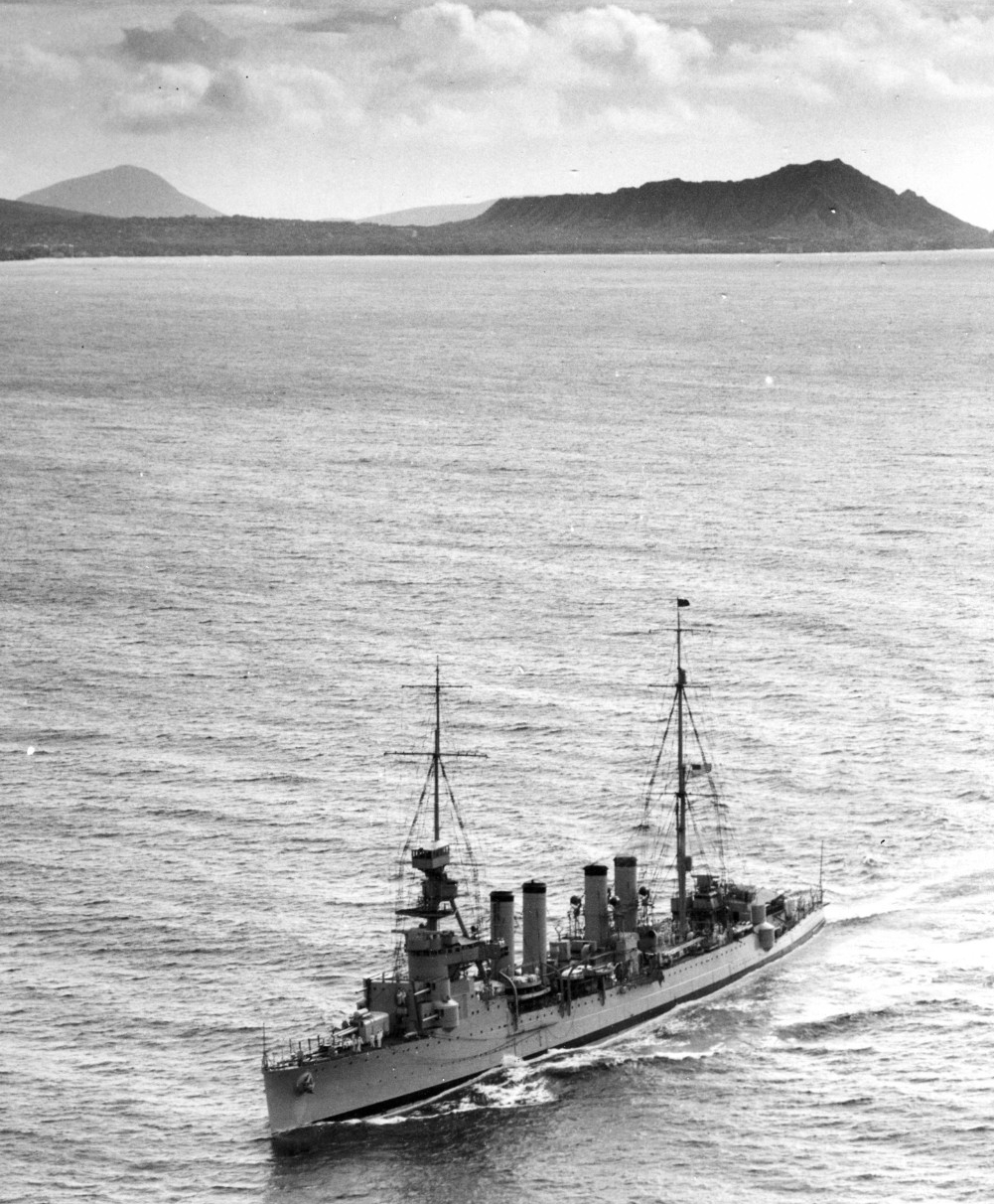 As temporary flagship (she flies a four-star flag at the main) for Adm. Richard H. Leigh, off Diamond Head, Honolulu, T.H., 20 October 1932. Close investigation of the image reveals a black-hulled admiral’s barge in skids to port of her no.2 stac...