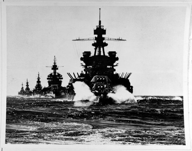 Pennsylvania followed by Colorado (BB-45) and the cruisers Louisville (CA-28), Portland (CA-33), and Columbia (CL-56) move in line into Lingayen Gulf preceding the landing on Luzon, 7-8 January 1945. (Naval History and Heritage Command Photograph NH 67432)
