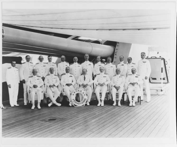 Assistant Secretary of the Navy Henry L. Roosevelt (seated, right center), and Adm. David F. Sellers, Commander in Chief, U.S. Fleet (seated, left center), with other U.S. Fleet flag officers on board Pennsylvania, Spring 1934. Courtesy of Rear Adm. Charles H. Lyman, USN (Ret.), 1972. (Naval History and Heritage Command Photograph NH 76413)