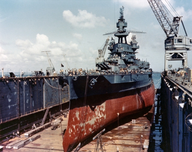 Pennsylvania drydocked in ABSD-7, October 1944. Note the extensive anti-torpedo blister built into her hull side and paravane streaming chains running from her forefoot to her foredeck. (U.S. Navy Photograph 80-G-K-2106, National Archives and Records Administration, Still Pictures Division, College Park, Md.)   