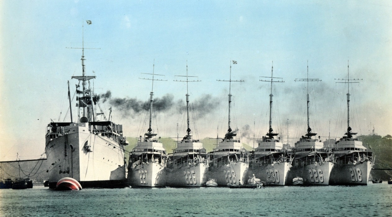 Pope, third from left, nested alongside the destroyer tender Black Hawk (AD-9) with other four-pipers at Chefoo, China, during the 1930s. (Color-tinted photograph by the Ah-Fung O.K. Photo Service, Naval History and Heritage Command Photograph NH...