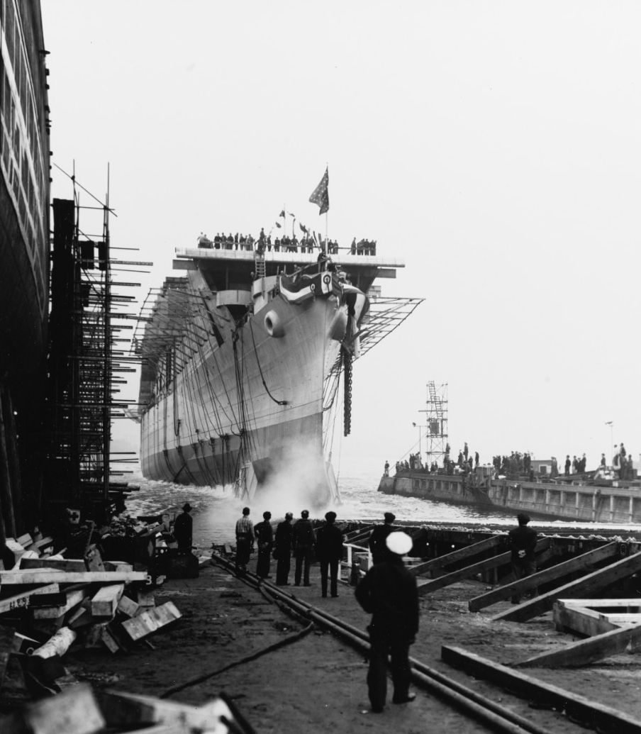 Princeton slides down the way as she is launched at her building yard, 18 October 1942. (U.S. Navy Bureau of Ships Photograph 19-N-46451, National Archives and Records Administration, Bureau of Ships Collection, College Park, Md.)