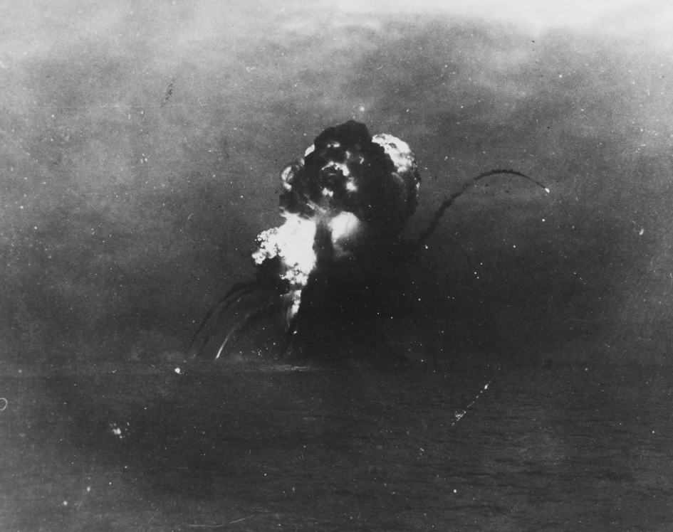 Princeton explodes as one of Reno’s torpedoes strikes home, scant moments before the stricken carrier takes her final plunge, 24 October 1944. (U.S. Navy Photograph 80-G-47305, National Archives and Records Administration, Still Pictures Division...
