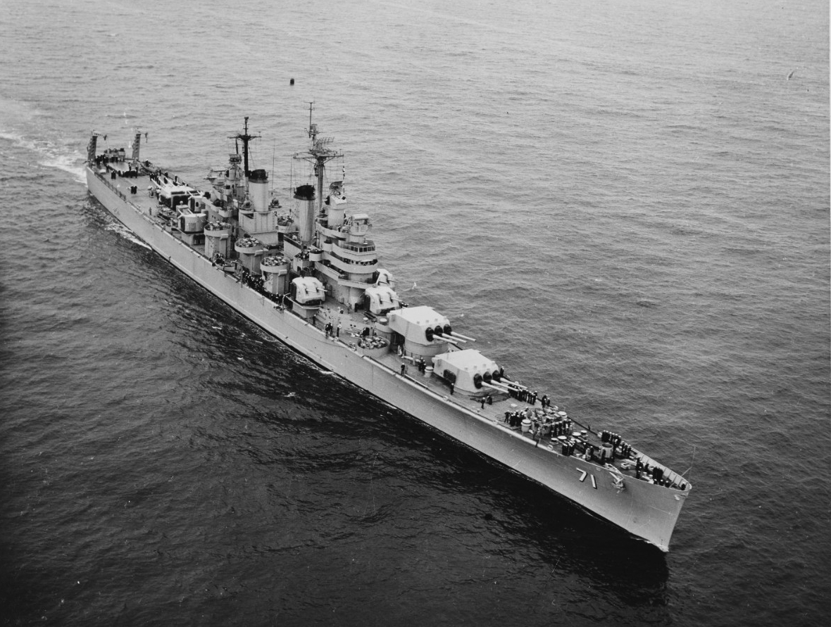 Quincy steams in the Pacific following her recommissioning to deploy to the Korean War, 1953. (Naval History and Heritage Command Photograph NH 97424)