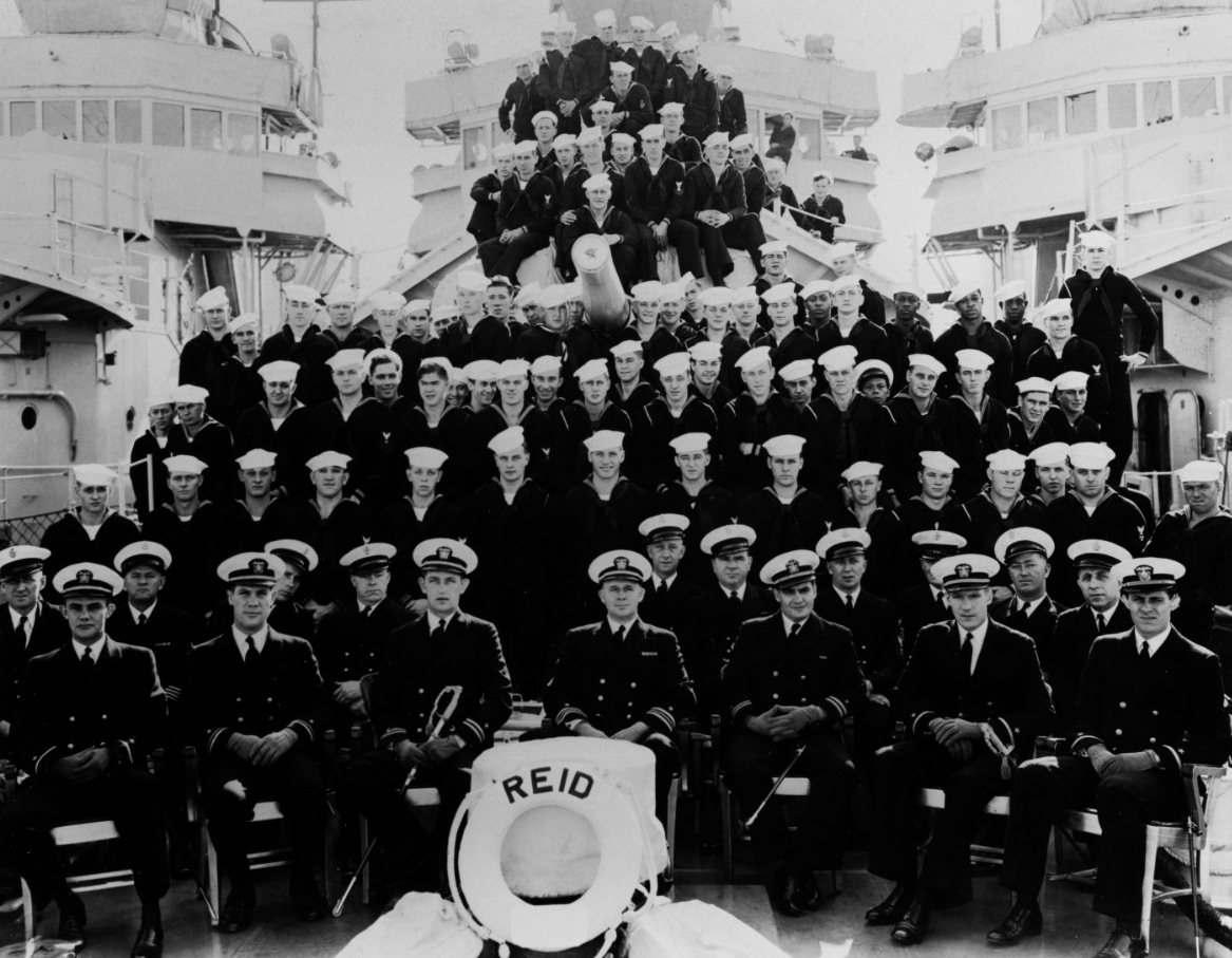 Reid’s ship’s company photographed in the Spring of 1940, just prior to a voyage to Lāhainā Roads, T.H. (Naval History and Heritage Command Photograph NH 86752)