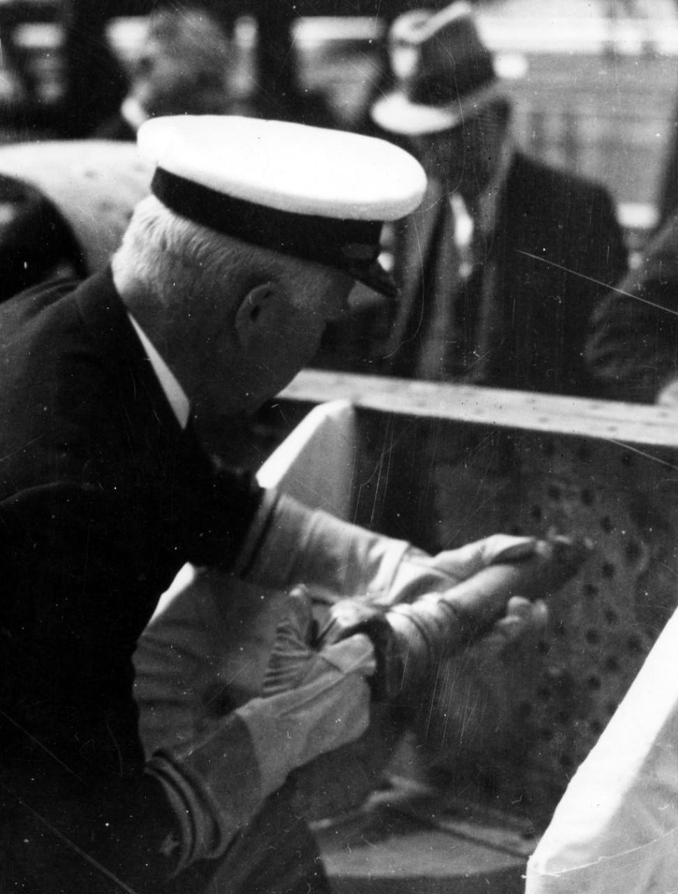 Rear Adm. Wat T. Cluverius, Commandant of the Philadelphia Navy Yard, drives the first rivet in Rhind’s keel on 22 September 1937. (U.S. Navy Bureau of Ships Photograph, RG-19-LCM, Box 407, National Archives and Records Administration, Still Pict...