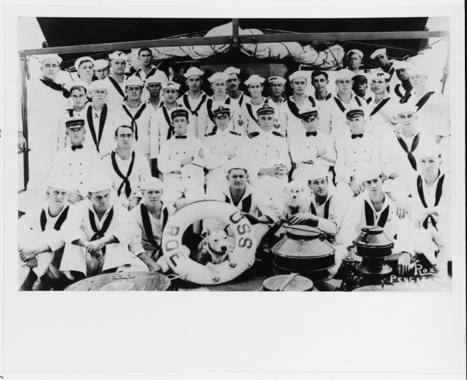 Roe’s officers and crew, circa 1915-1916. The two officers in the center are possibly (from left to right): Lt. (j.g.) Aaron S. Merrill, and Lt. (j.g.) Guy C. Barnes, Roe's commanding officer. The original photograph by Rox, 518 So. Palafox, Pensacola, Fla. was printed on a postal card, which was mailed at Pensacola on 23 September 1916 with the message: “Look natural?” (Naval History and Heritage Command Photograph NH 93718; courtesy of Jack Howland, 1982).